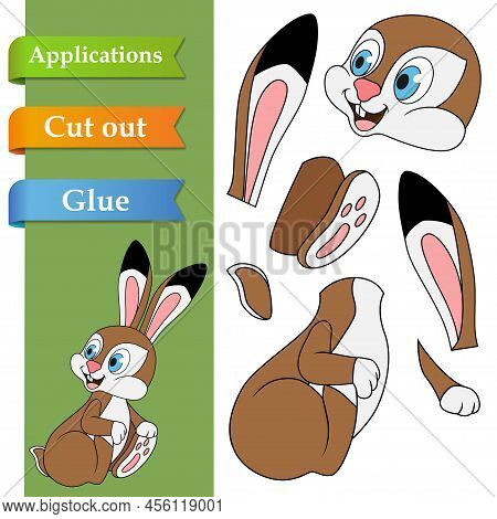 Create Paper Application The Cartoon Sitting Hare. Use Scissors Cut Part Of Rabbit And Glue On The P
