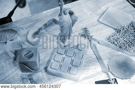 Many Different Models Printed On 3d Printer. Gray And Black Objects Printed On 3d Printer Made Of Pl