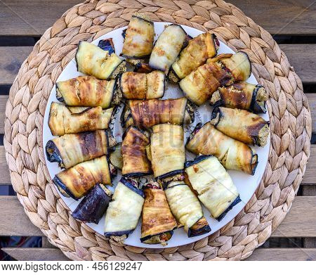 Eggplant Rolls Fill In With Tomato And Garlic Mixture Situated On The Natural Cruft Beige Rattan Str