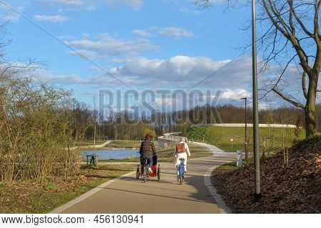 Hasselt, Limburg - Belgium 26-03-2021. Bicycle Ride In The Park. Urban Winter Landscape In European 
