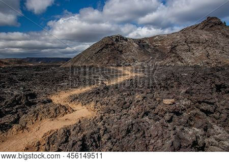 Beautiful Colourful Icelandic Landscape Lava Fields Mountain Geysers Zigzag Road And Moss-covered St