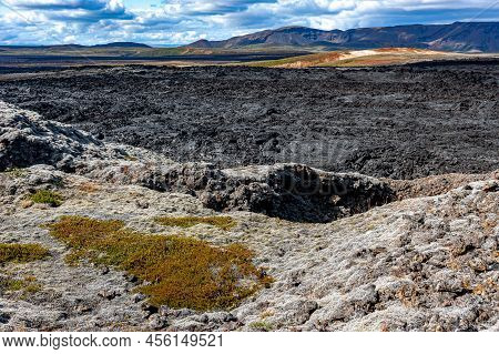 Beautiful Colourful Icelandic Landscape Lava Fields Mountain Geysers Zigzag Road And Moss-covered St