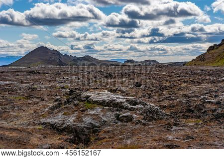 Beautiful Colourful Icelandic Landscape Lava Fields Mountain Geysers Zigzag Road And Moss-covered St