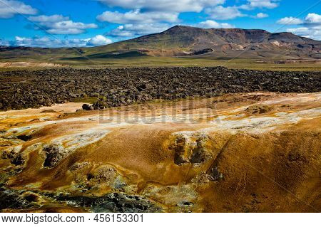 Beautiful Colourful Icelandic Landscape Lava Fields Mountain Geysers Zigzag Road And Moss-covered St