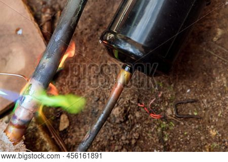Green Flame In Copper Pipe While Joining Pipe With Fitting The Central Aitr Conditioner Unit