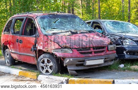 A Car Destroyed By Shrapnel From A Rocket That Exploded Nearby. Irpensky Automobile Cemetery. Conseq