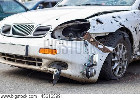 A Car Destroyed By Shrapnel From A Rocket That Exploded Nearby. Irpensky Automobile Cemetery. Conseq