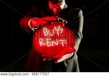 Sign Displaying Buy Question Rent. Internet Concept Group That Gives Information About Renting House