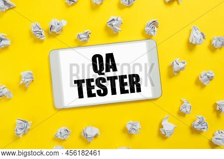 Hand Writing Sign Qa Tester. Internet Concept Quality Assurance Of An On Going Project Before Implem