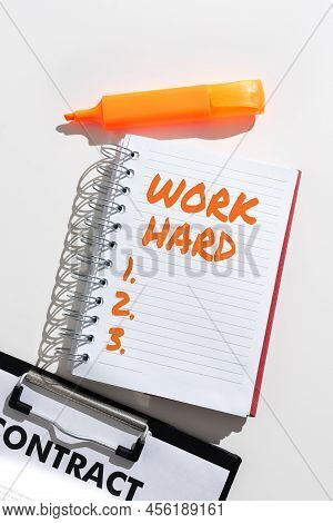 Text Sign Showing Work Hard. Business Concept Laboring That Puts Effort Into Doing And Completing Ta