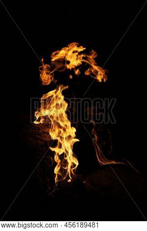 Fiery Abstraction On Black Background. Flame On Mount Chimera At Place Where Natural Gas Comes Out O