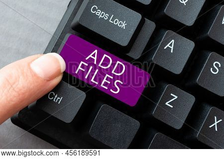 Hand Writing Sign Add Files. Internet Concept To Put More Information To A Certain Person, Thing, Or