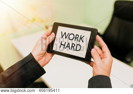 Conceptual Caption Work Hard. Business Overview Laboring That Puts Effort Into Doing And Completing 