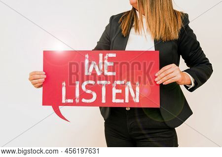Writing Displaying Text We Listen. Business Concept Group Of Showing That Is Willing To Hear Anythin