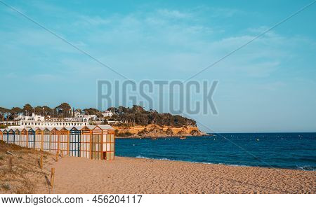 Famous Beach Huts In Sagaro With Playa De Sant Pol, Costa Brava. Spain. Mediterranean Sea