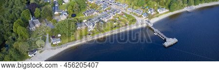 Luss Village Aerial View During Summer Over Loch Lomond