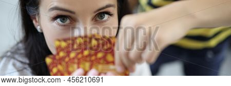 Close-up Of Mother Playing Card Game With Son And Bluffing To Win. Spending Quality Time With Child 