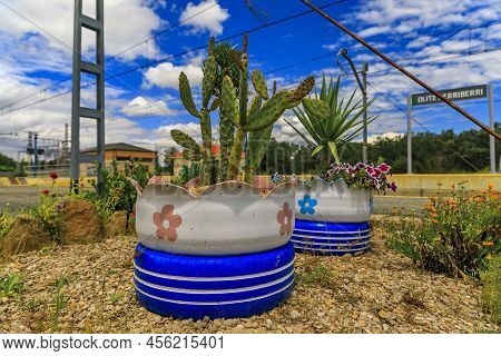 Cactus Growing In Planters Made Of Old Recycled Car Tires By The Train Tracks At The Olite Or Erribe