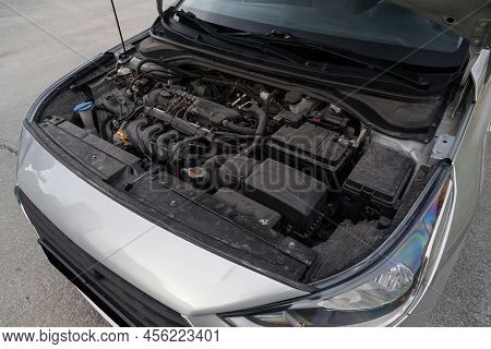 Car Crash Open Hood Car Mechanic To Check Condition Of Damage. See The Radiator Cooling Panel Engine