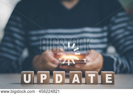 Smartphone And Wooden Block Cube Update Software Computer Program Upgrade Business Technology Intern