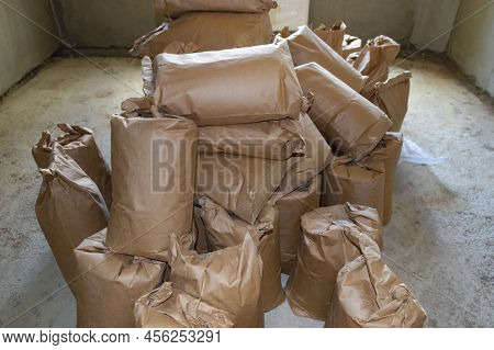 Cement Bagbuilding Mix Bags. Delivery Of Cement And Plaster For Works. Paper Bags With Cement And Bu