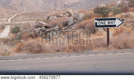 One Way Road Transport Sign With Arrow On Roadside Or Wayside, Highway Or Freeway In California Usa.