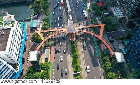 Aerial Pedestrian Bridge Near The Bus Stop Karet Sudirman Known. New Icon Jembatan Phinisi In Jakart