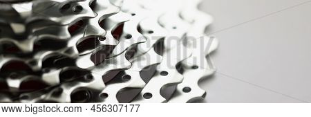 Close-up Of Bicycle Roller Chain That Transfers Power From Pedals To Drive. Rear Cassette In Mountai