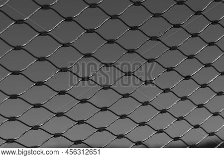 Metal Wire Fence In Black And White