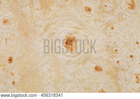 Plain Wheat Tortilla Wraps. Spanish Or Mexican Circular Unleavened Flatbread From Wheat Flour. Ingre