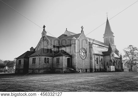 Merksplas, Belgium, April 27th, 2022, The Chapel In Merksplas Colony In The Bright Sunrise Light . H