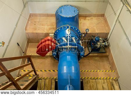 Modern River Hydroelectric Turbine Engine Room. Small Rivers Of Latvia
