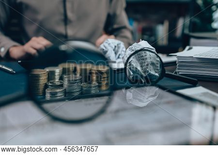 Magnifying Glass See Coin And Fail Paper Crump.  Accounting  Check   Financial Path Concept..