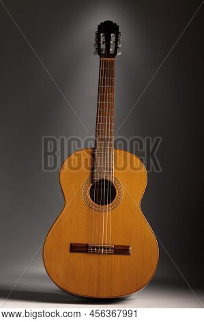 Classical Guitar On A Dark Grey Background