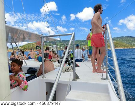 The People At Snorkeling Underwater And Fishing Tour By Boat At The Caribbean Sea At Honeymoon Beach