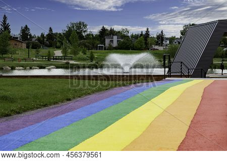 Airdrie Alberta Canada, June 12 2022: Pride Month Rainbow Flag Colours Painted Onto A Public Walkway