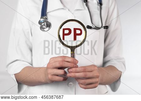 Pp Vitamin, Word Acronym Through Magnifying Glass. High Quality Photo