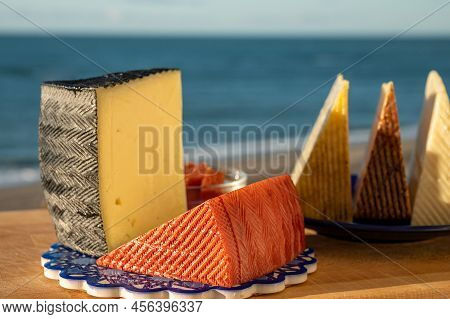 Assortment Of Spanish Hard Cheeses, Curado, Manchego, Goat Cheese Served Outdoor With Membrillo Jam