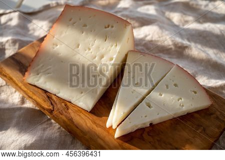 Spanish Hard Manchego, Cow, Sheep And Goat Cheese Served Outdoor In Morning Sunlights