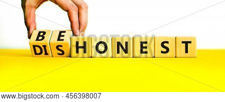 Be Honest Or Dishonest Symbol. Businessman Turns Cubes And Changes Concept Words Dishonest To Be Hon