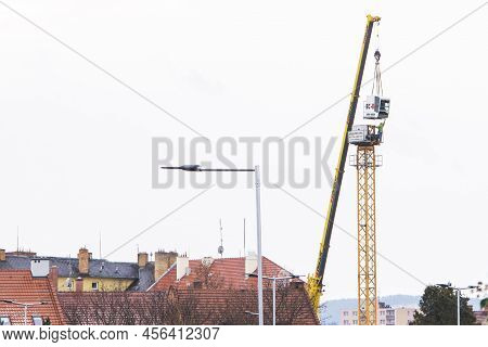 Prostejov December 4th 2017 Czech Rep. Builder Assembles A Construction Tower Crane. High Percentage