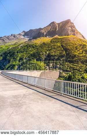 Huge Concrete Apline Dam On Sunny Summer Day. Zillergrundl Speicher, Zillertal Alps, Austria