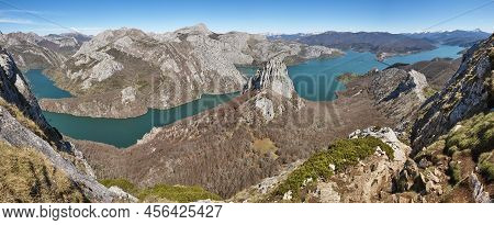 Picturesque Reservoir And Mountain Panoramic Landscape In Riano. Hikkers. Spain