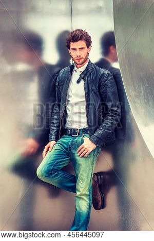 Man Spring/autumn Casual Fashion. Young Guy With Beard, Wearing Black Leather Jacket Unbuttoned, Blu