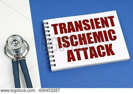 Medical Concept. On A Blue-white Surface Lies A Stethoscope And A Notepad With The Inscription - Tra