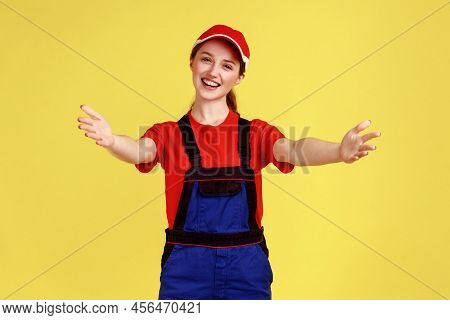 Happy Smiling Handy Woman Standing With Outstretched Hands, Inviting To Embrace, Come Into My Arms, 
