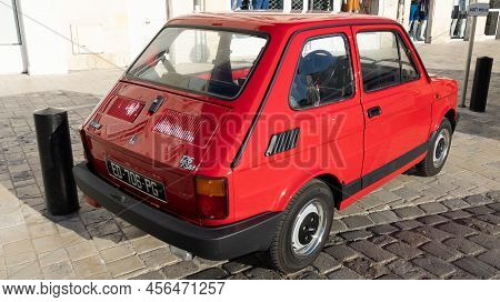 Bordeaux , Aquitaine  France - 06 12 2022 : Fiat 126 Red Vintage Model Old Timer Car In Street Parke
