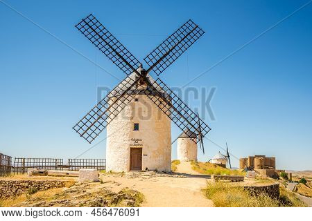 View At The Windmills And La Muela Castle Near Consuegra Town In Spain