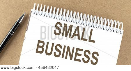 Small Business Text On Notepad With Pen, Business