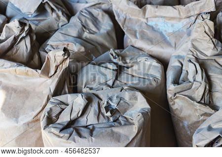 Cement Bagbuilding Mix Bags. Delivery Of Cement And Plaster For Works. Paper Bags With Cement And Bu